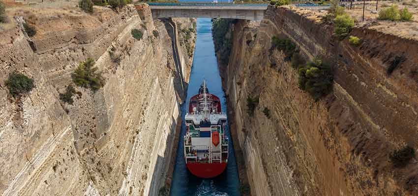A ship sailing through the Corinth Canal