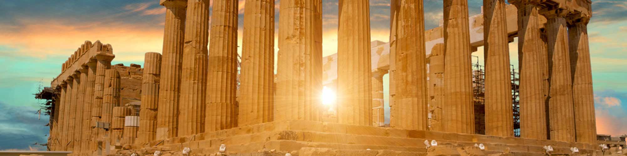 Sun rising behind the Parthenon at the Acropolis